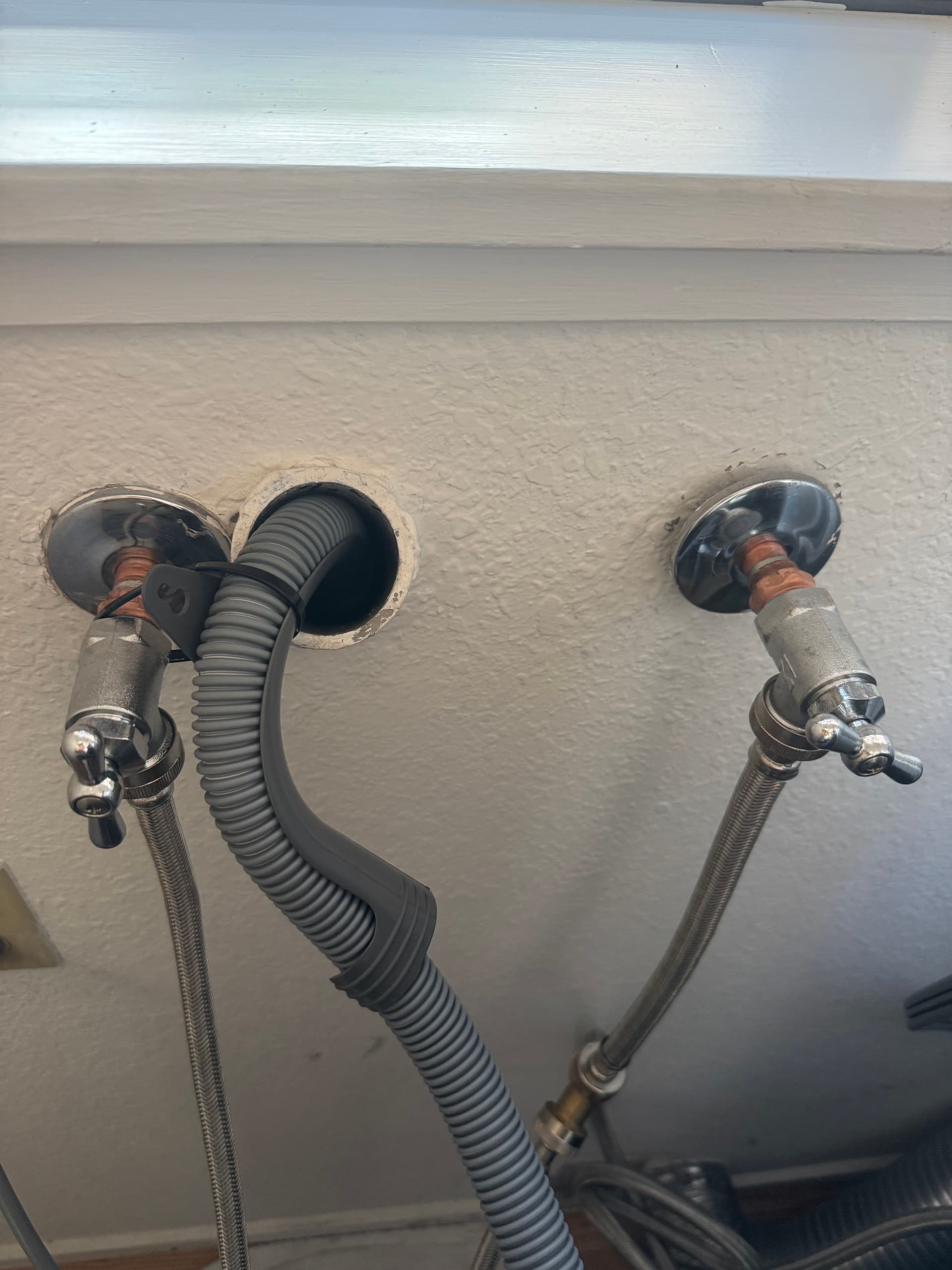 Worn Washing Machine Bibs Replaced Before Hidden Water Damage Got Worse image