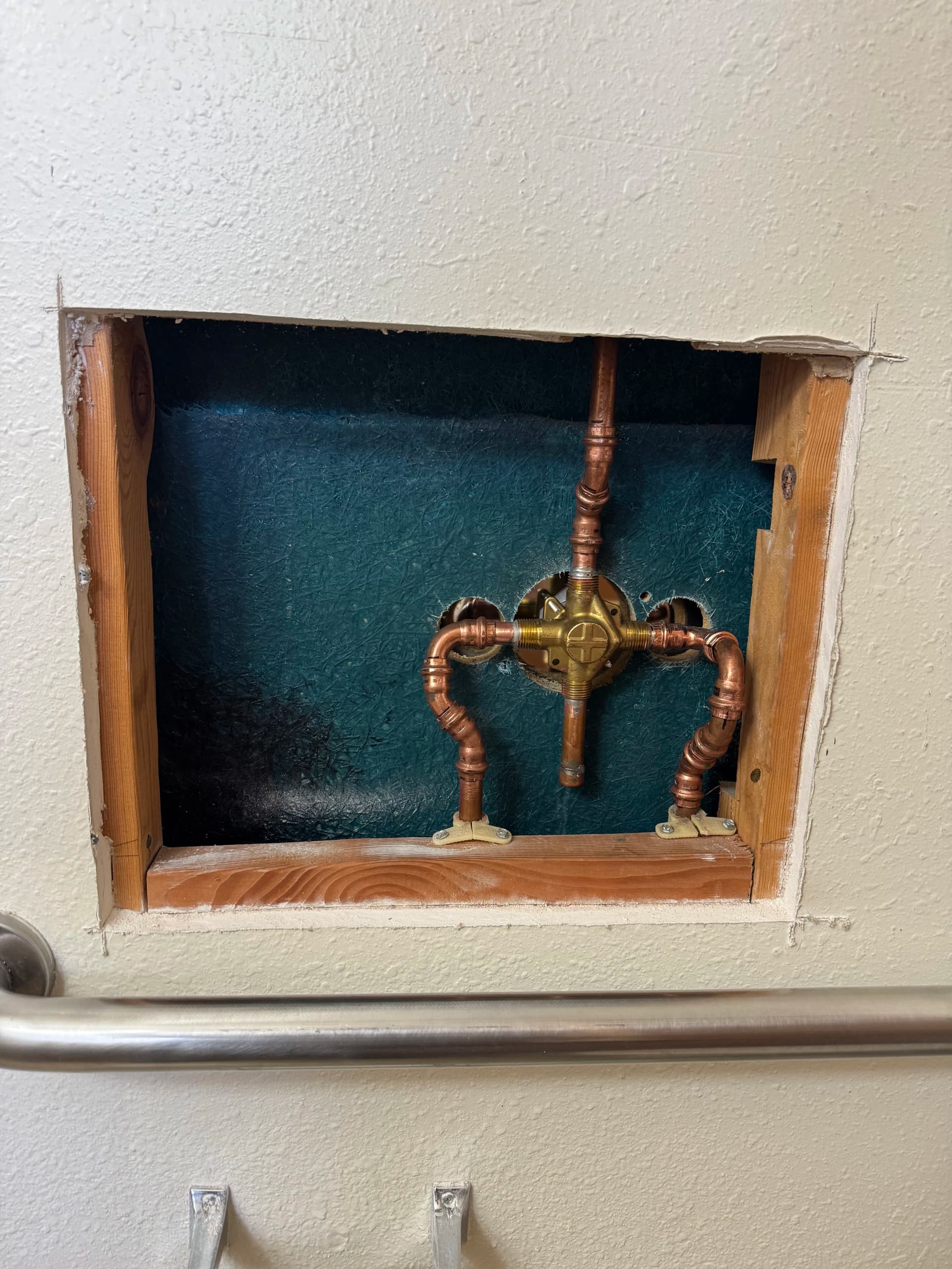 Worn Shower Valve Replaced with a Moen Posi-Temp Rough-In image
